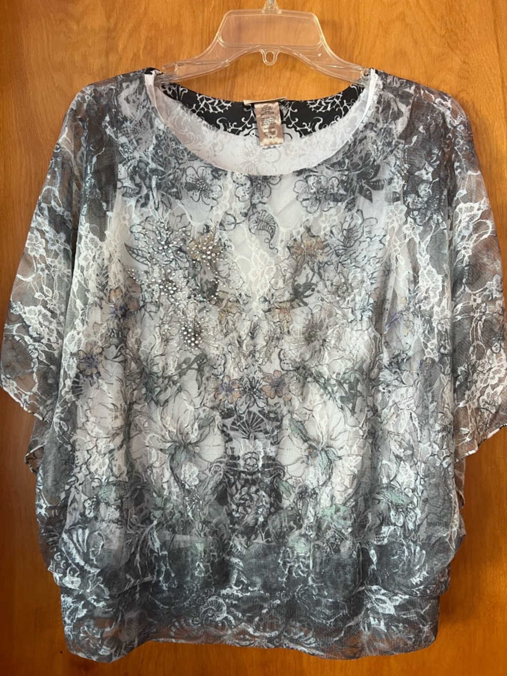 Brittany Black size medium embellished top with lace overlay